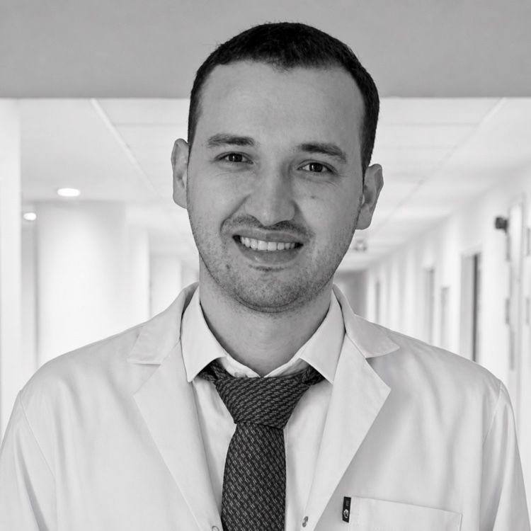 Headshot photograph of Ahmad Kunbaz, MD