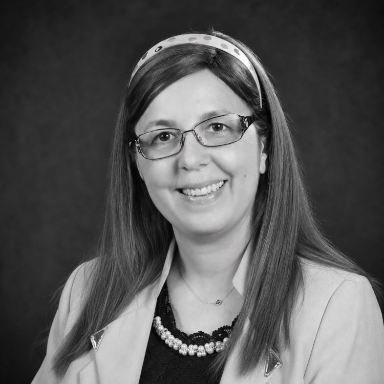 Headshot photograph of Arwa Alazma, MD, PhD